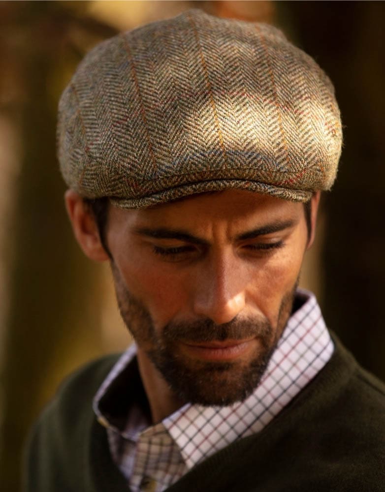 Coppola in lana Harris Tweed verde con paraorecchie - Harris Tweed Flat cap with ear flaps
