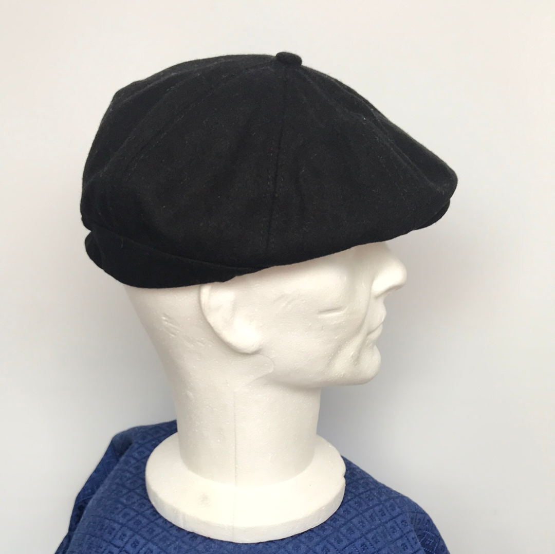 Coppola nera nuova in lana a otto spicchi con bottone piccolo di colore nero - Shop In London