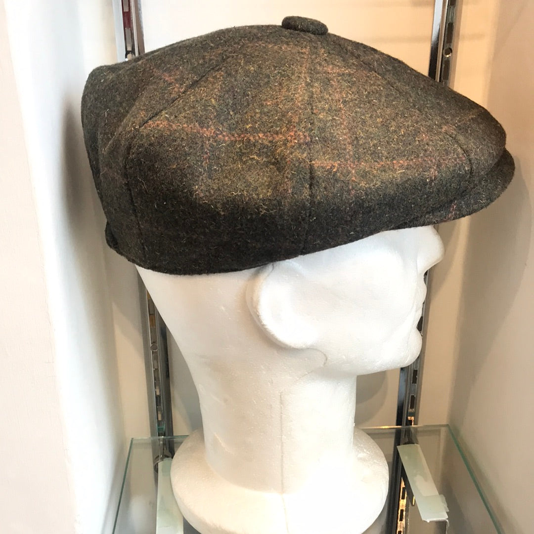 Coppola nuova Peaky Blinders in tweed verde scuro