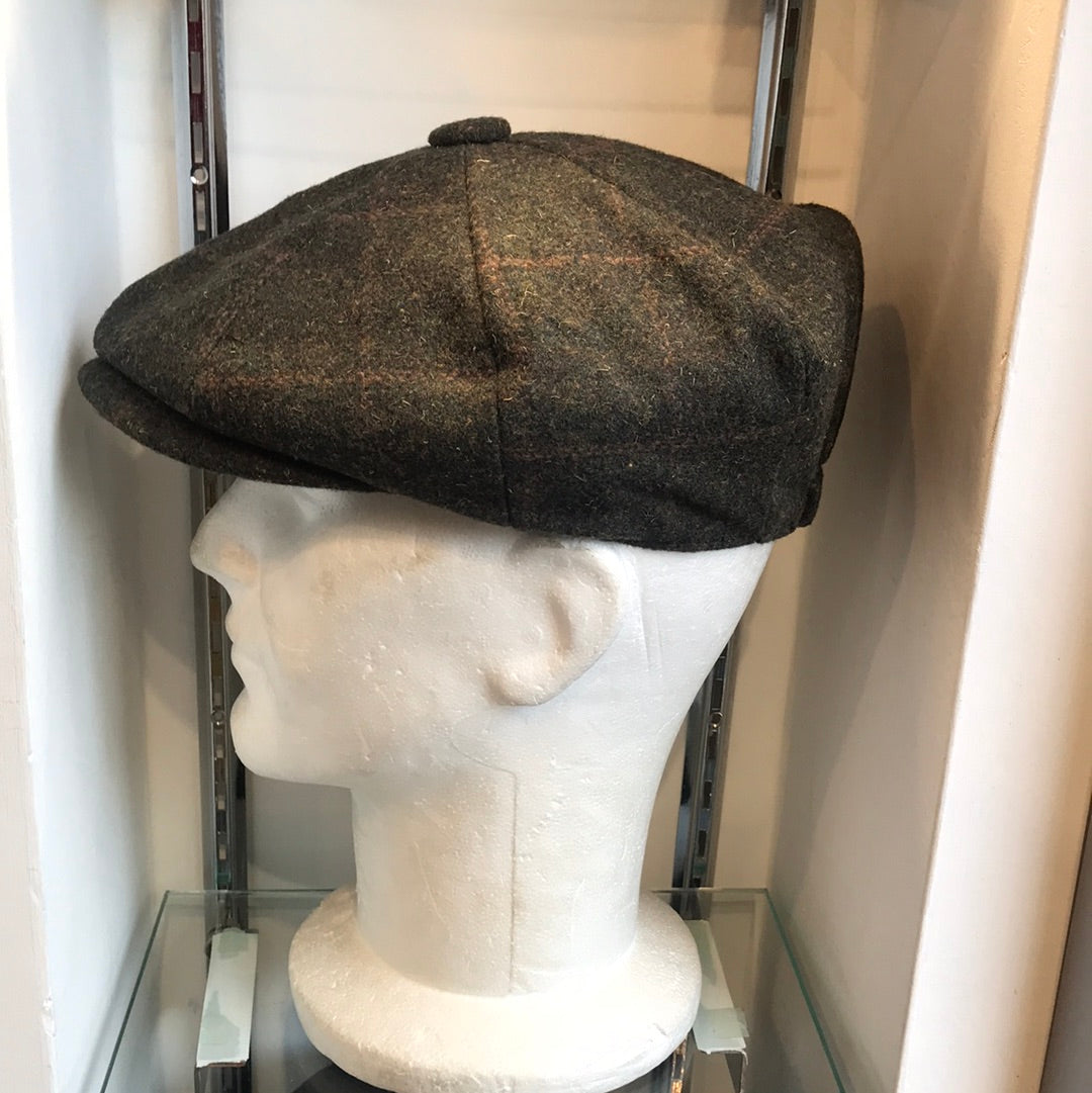 Coppola nuova Peaky Blinders in tweed verde scuro