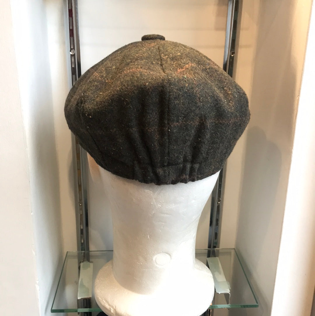 Coppola nuova Peaky Blinders in tweed verde scuro