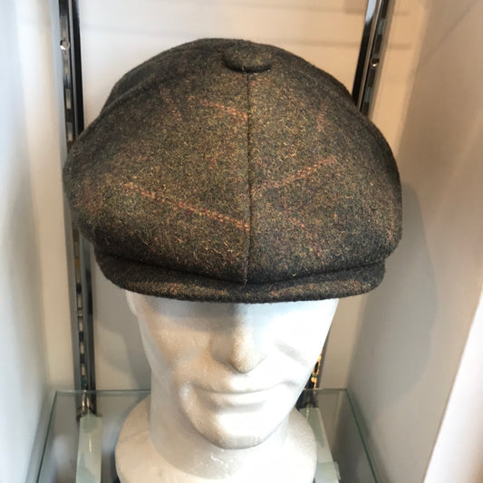 Coppola nuova Peaky Blinders in tweed verde scuro