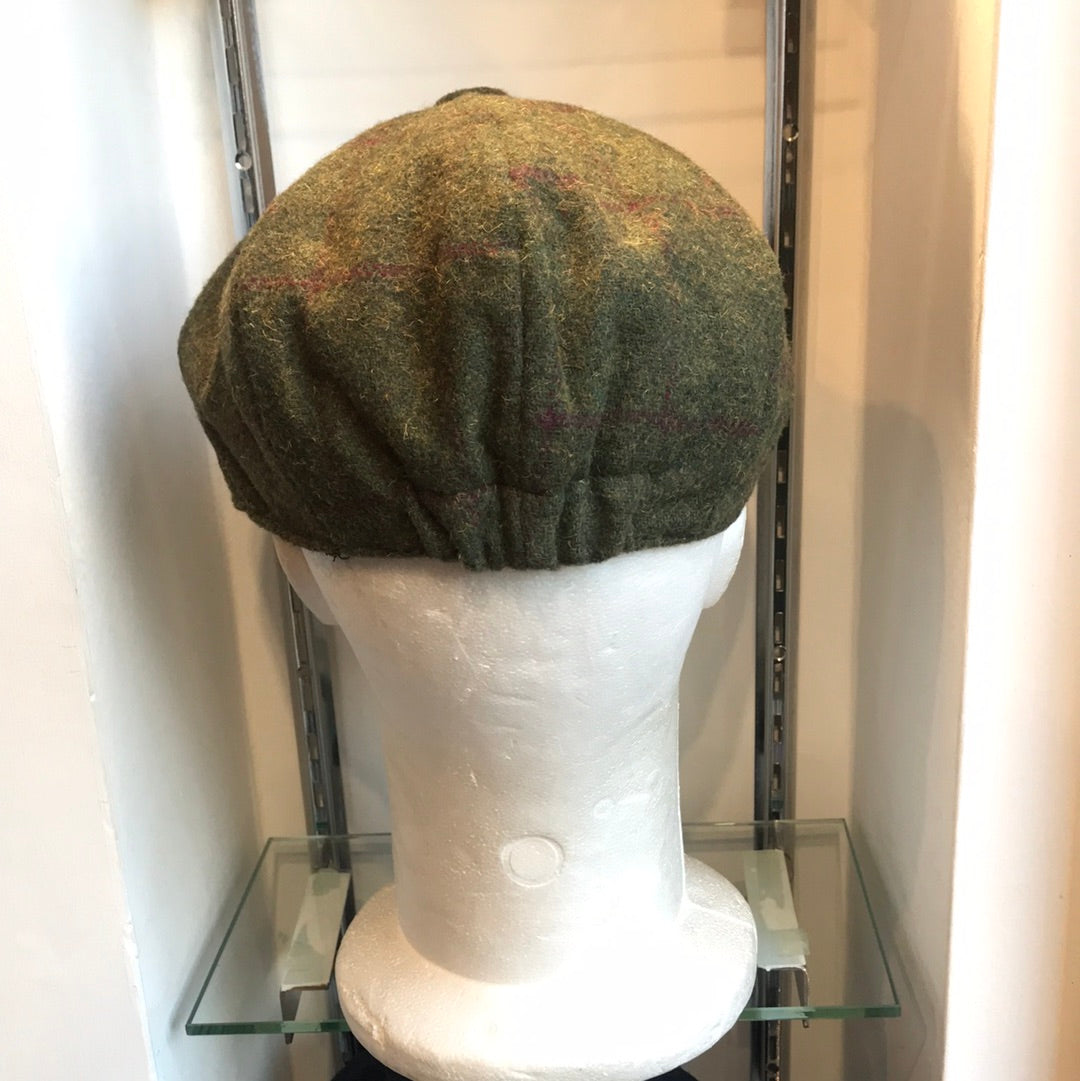 Coppola nuova Peaky Blinders in tweed verde chiaro