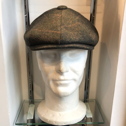 Coppola nuova Peaky Blinders in tweed verde scuro